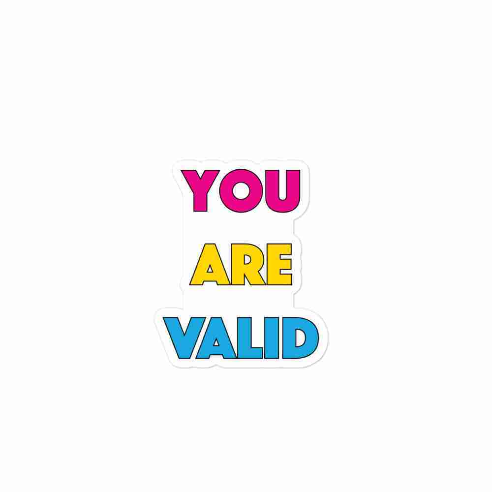A sticker of text reading "You are valid" in all caps; "You" is magenta, "are" is yellow, and "loved" is light blue.