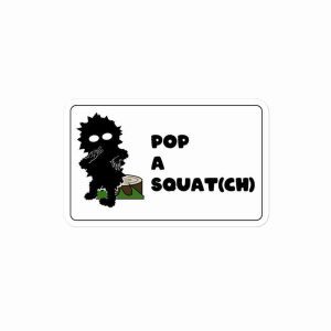 A sticker of Jim the Squatch sitting on a tree stump, with text to the right reading "Pop a Squat(ch)".
