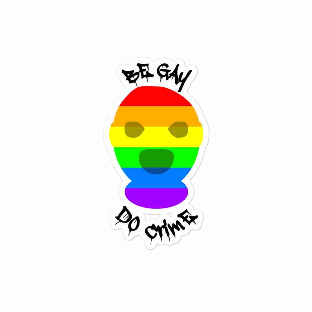 A sticker of a rainbow-striped balaclava with text around reading "Be gay, do crime".
